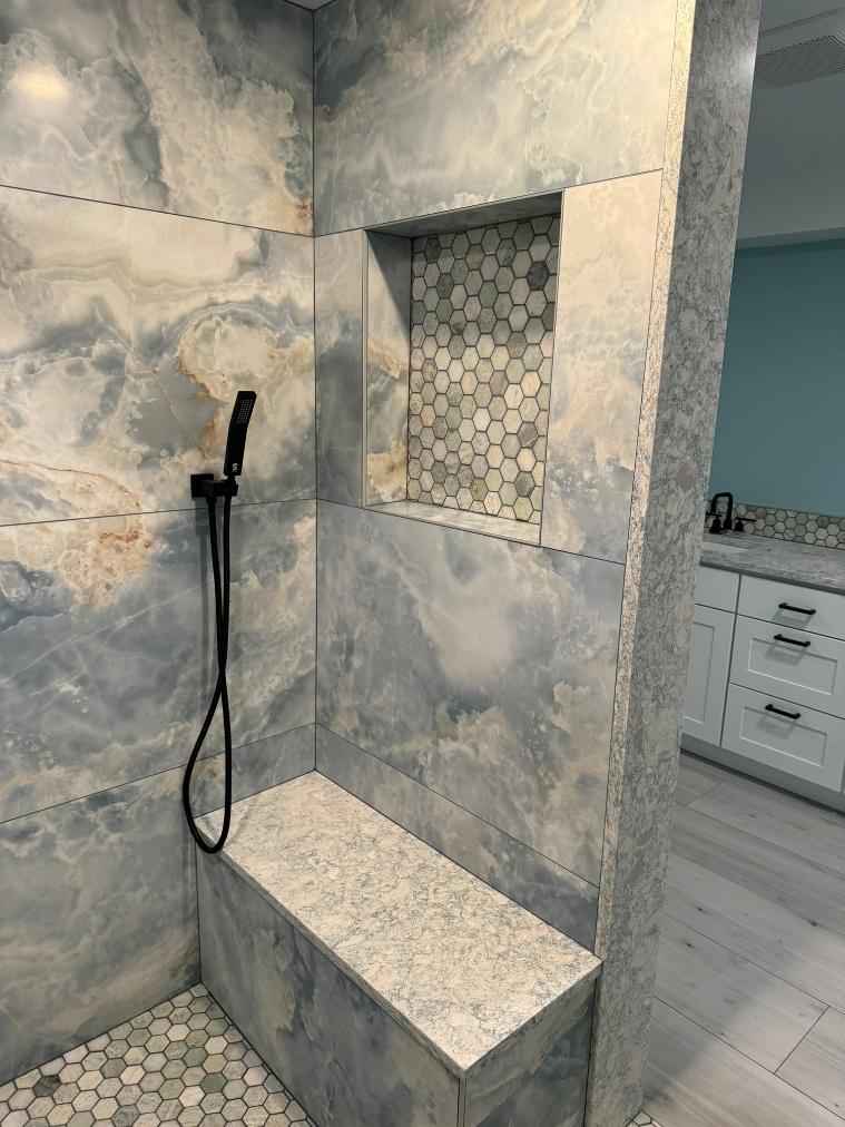 High-end bathroom remodel with marble shower and premium features in Kirkland WA