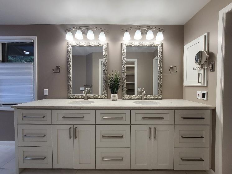 Mid-range bathroom remodel with double vanity expansion in Kirkland WA